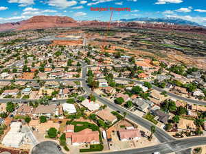Aerial view of residential area featuring mountains