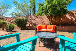 Fenced backyard featuring a patio area