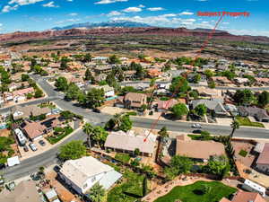 Aerial view of residential area with a mountain backdrop