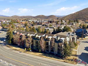 Aerial view of residential area with a mountainous background