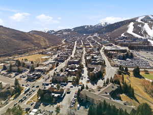 Aerial overview of property's location with mountains