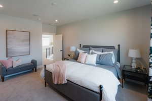 Bedroom with carpet floors and recessed lighting