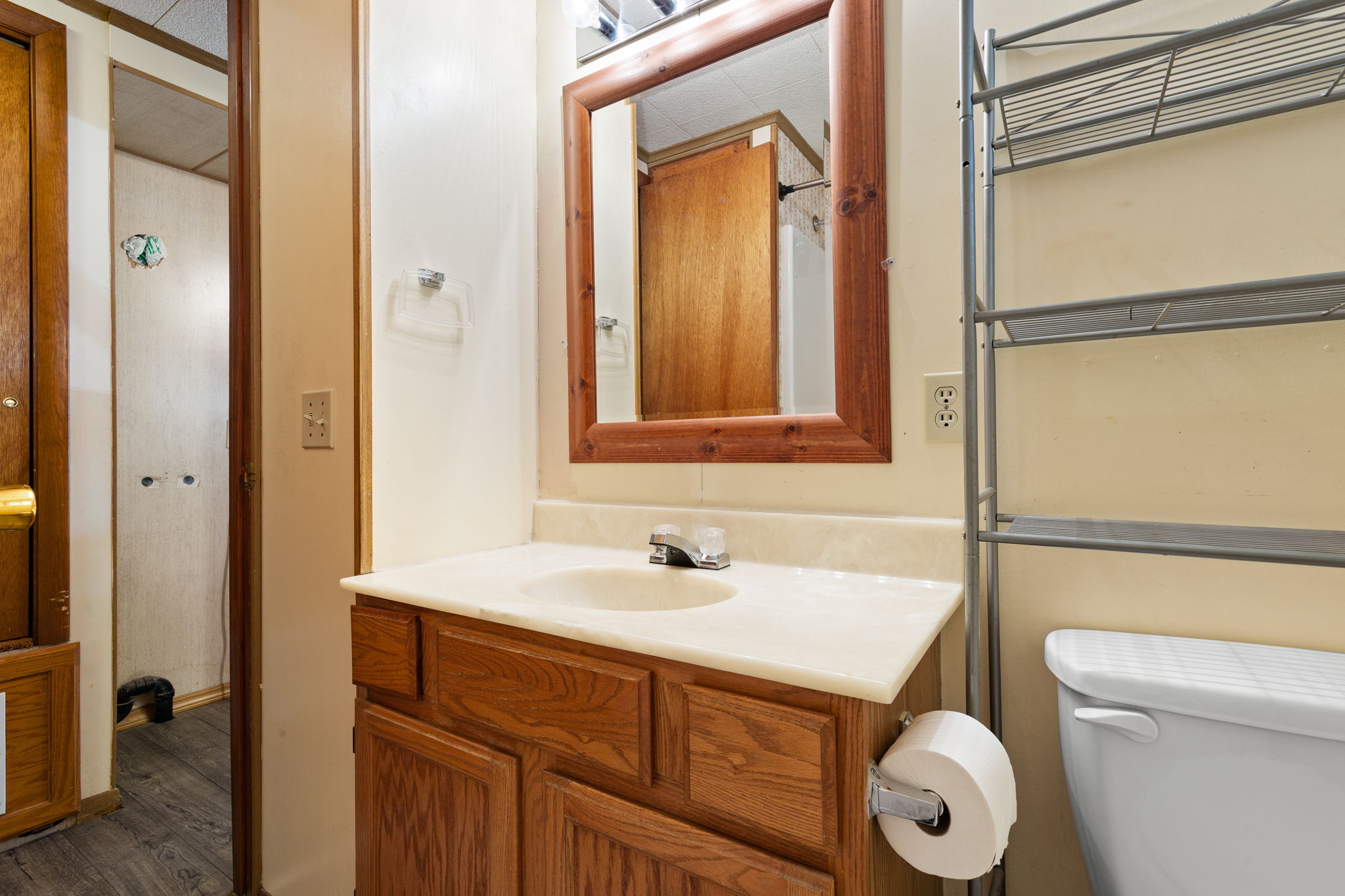Half bath with toilet and vanity