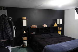 Bedroom with carpet