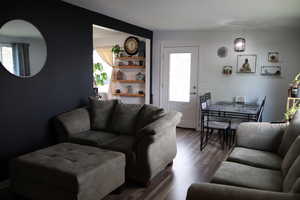 Living area featuring wood finished floors