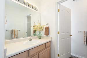 Full bathroom featuring vanity