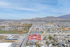 Aerial view of residential area featuring mountains