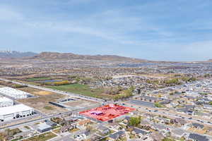 Aerial view of residential area featuring mountains