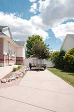 Long concrete driveway offering convenient parking