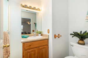 Bathroom with vanity and toilet