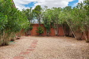 View of fenced backyard