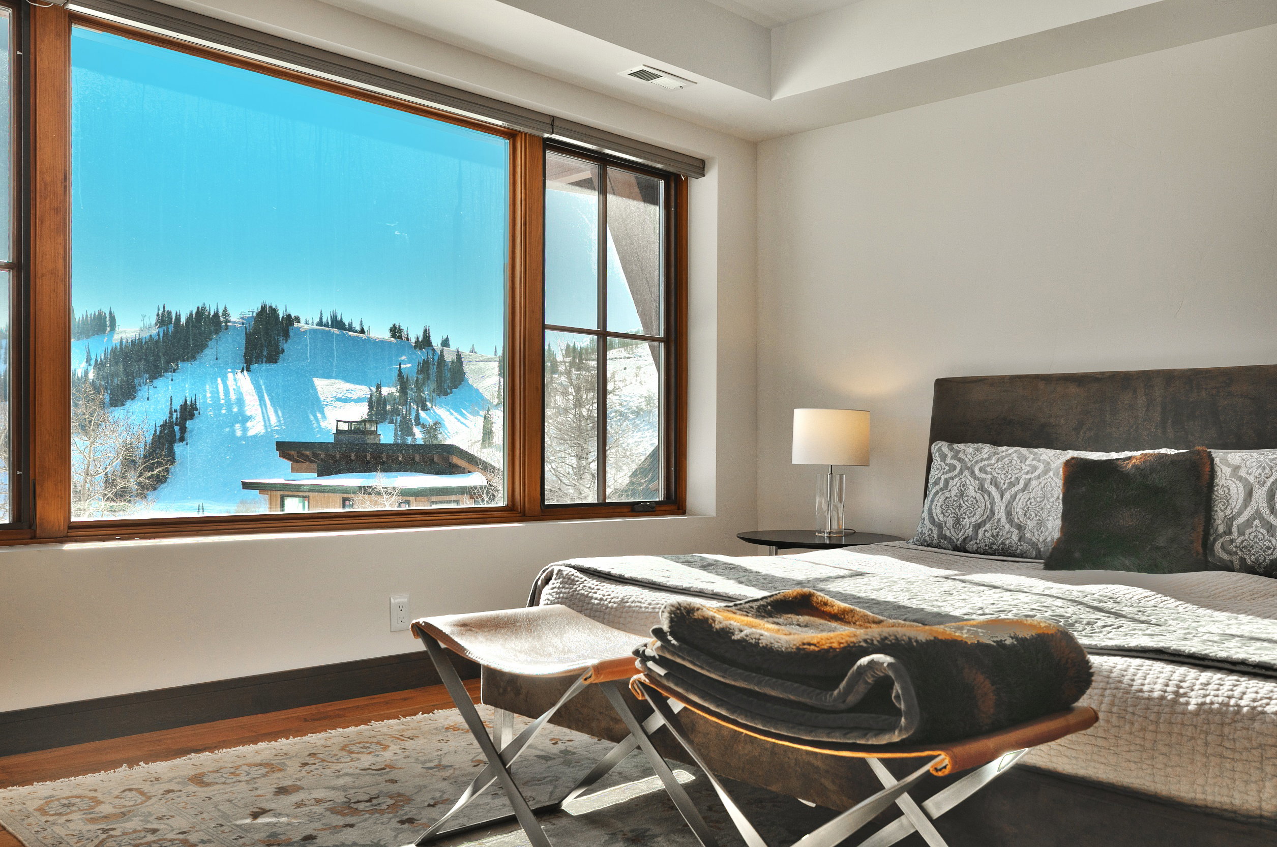 Bedroom featuring baseboards and wood finished floors