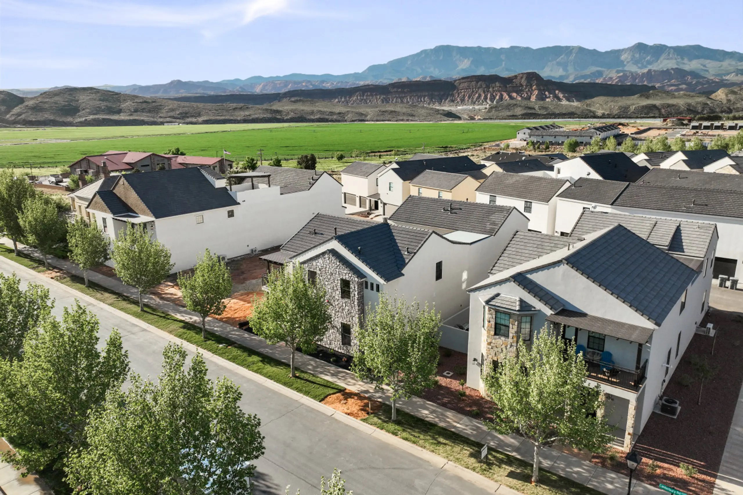 Aerial view of residential area with a mountain backdrop