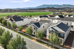 Aerial view of residential area with a mountain backdrop