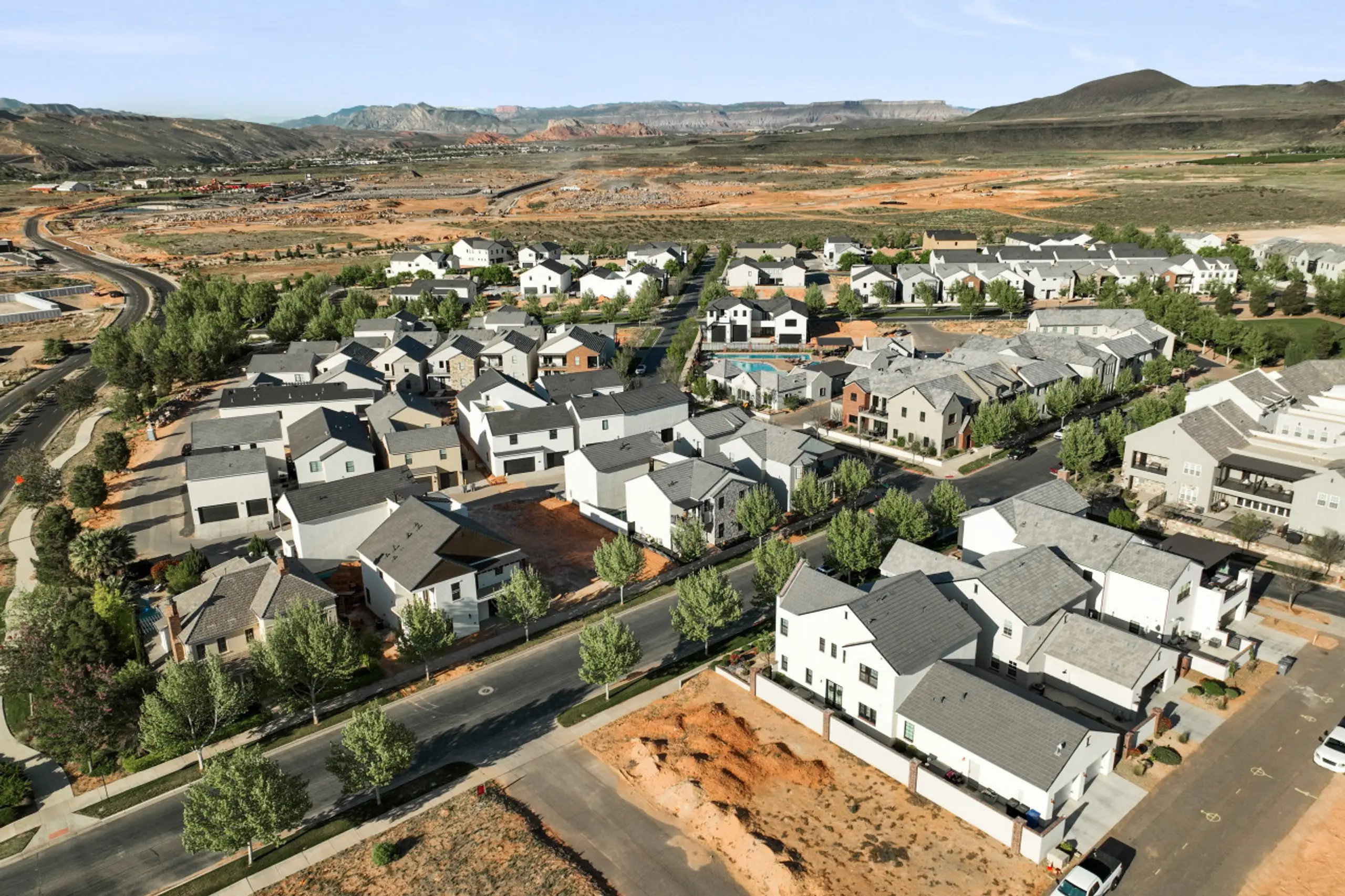 Aerial view of property's location with nearby suburban area