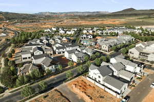 Aerial view of property's location with nearby suburban area