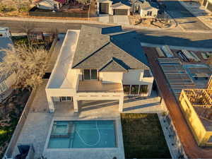 Aerial perspective of suburban area with a pool area