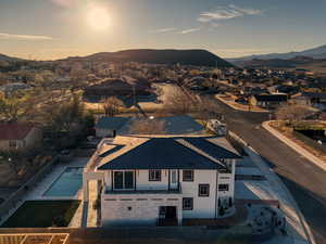 Aerial view at dusk of a mountain view and a residential view