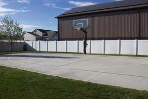 View of sport court with basketball hoop