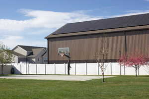 View of basketball court featuring basketball hoop
