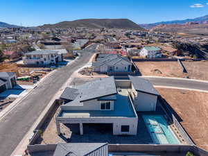 Aerial perspective of suburban area featuring mountains