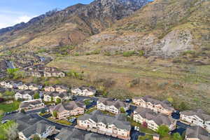 Aerial view of residential area featuring a mountain backdrop