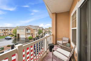 Balcony featuring a residential view