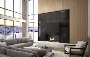 Living area featuring wood walls, a fireplace, a high ceiling, and wood finished floors