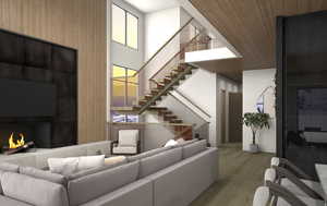 Living room with hardwood / wood-style flooring and a large fireplace