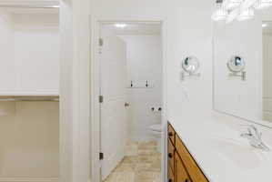 Bathroom with vanity and toilet