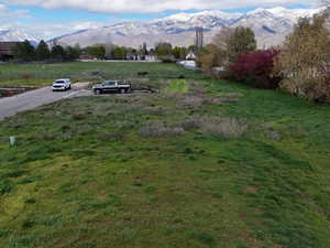 View of yard with a mountain view and a rural view
