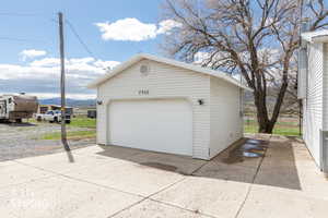 Detached garage featuring a mountain view