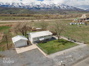 Aerial view of sparsely populated area featuring a mountainous background