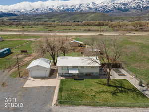 Aerial view of sparsely populated area with a mountainous background