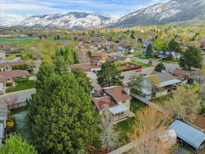 Aerial view of residential area featuring a mountainous background