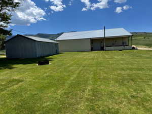 Rear view of Cleary Building and metal shed, backyard