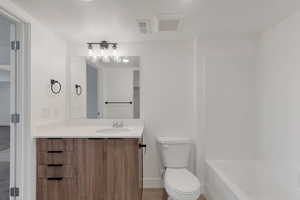 Full bathroom featuring vanity and bathing tub / shower combination