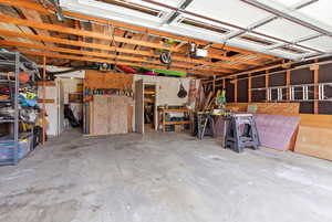 Garage featuring a garage door opener