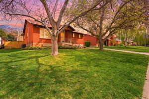 View of front of property featuring brick siding