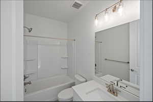 Full bath featuring shower / washtub combination and vanity