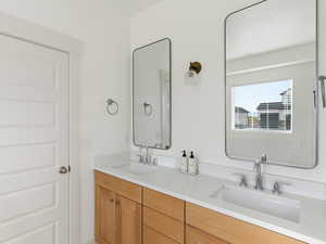 Bathroom featuring double vanity