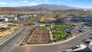 Aerial view of residential area featuring a mountain backdrop