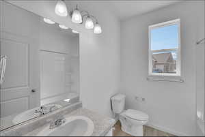 Bathroom featuring vanity and light wood-type flooring
