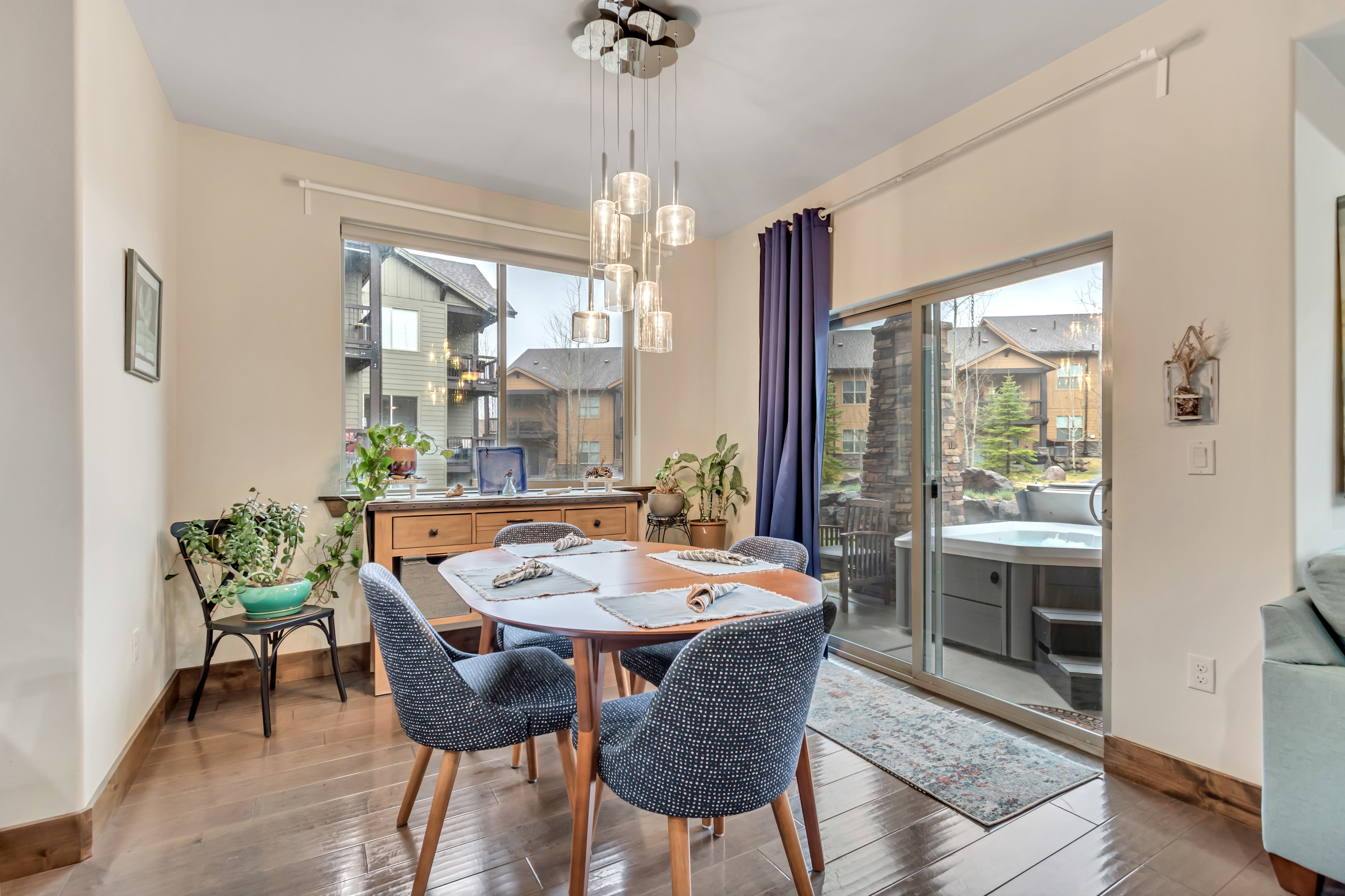 Dining area featuring hardwood / wood-style floors and hanging lights