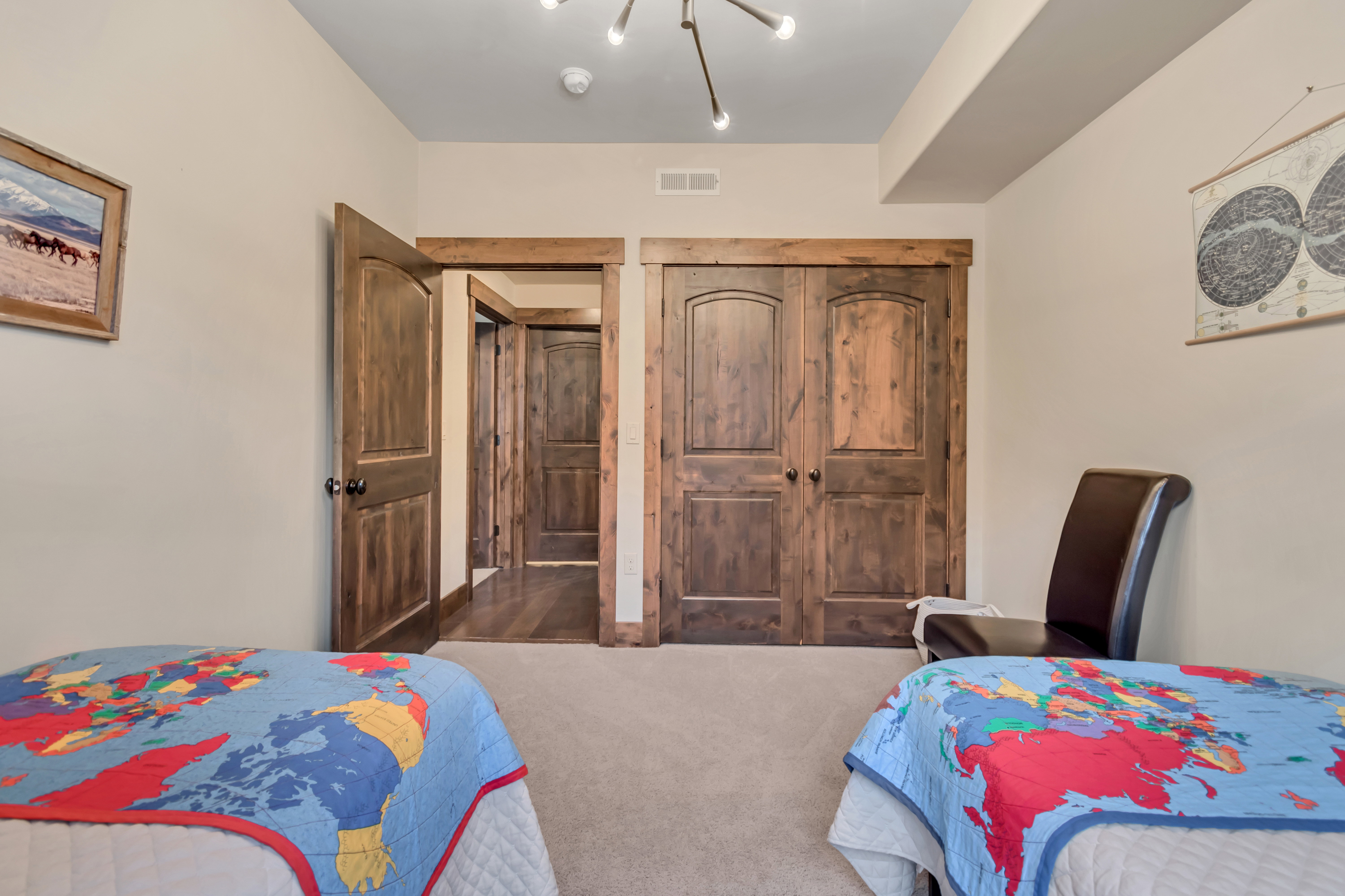 Carpeted bedroom featuring a closet