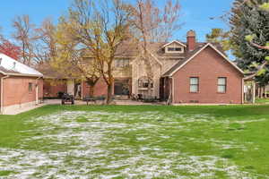 View of back side of home showing new brick.