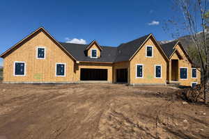 Property under construction featuring roof with shingles