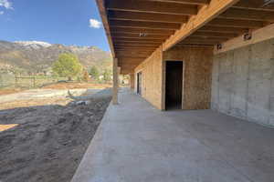 View of patio with a mountain view