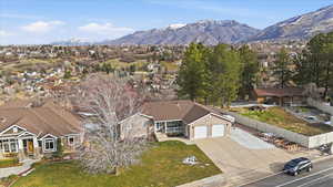 Aerial perspective of suburban area with a mountain backdrop and views! Lots of parking