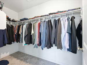 Large primary bedroom with en-suite bath and large walk-in closet